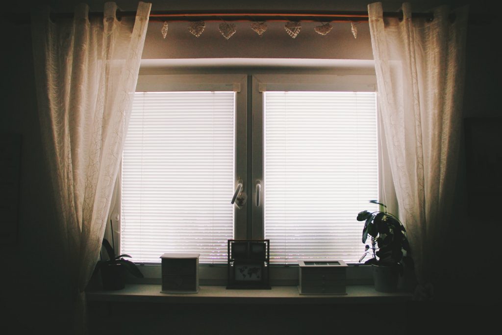 Window with Blinds and Curtain