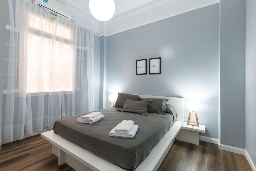 bedroom with light blue walls