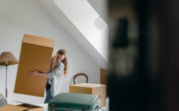 woman moving moving box