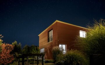 wooden house at night