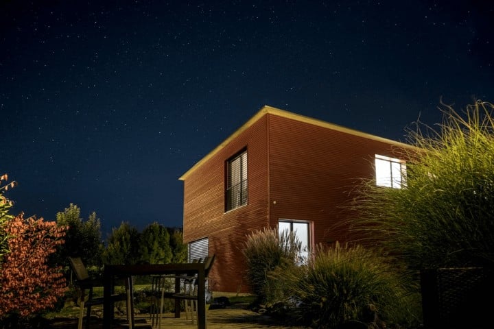 wooden house at night