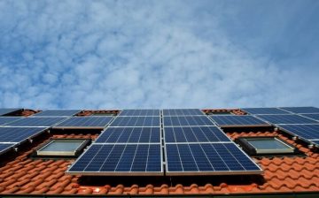 Group of large solar panels installed on a new home