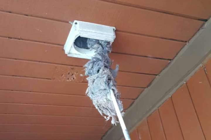 man cleaning Dryer Vents