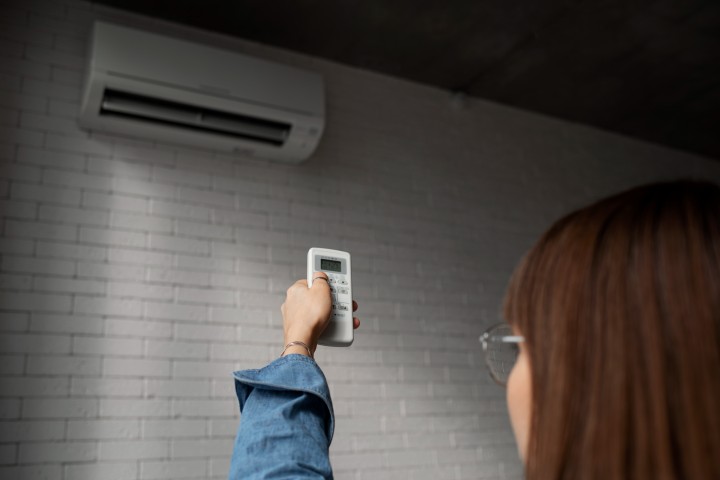 young woman using HVAC systems