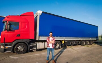 man outside his truck with integrated camera