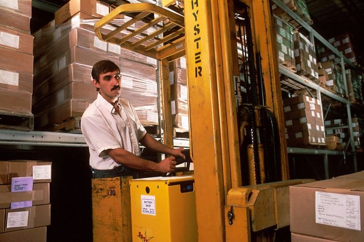 man working in storage space