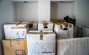 moving boxes piled up in new house