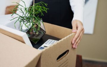 office worker packing his things for moving