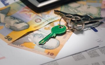 money in the box with keys to a new house