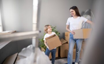 woman with her child moving house