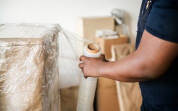 man packing door for moving