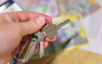 man with keys in his hand