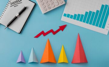 top view business items with growth cones arrow