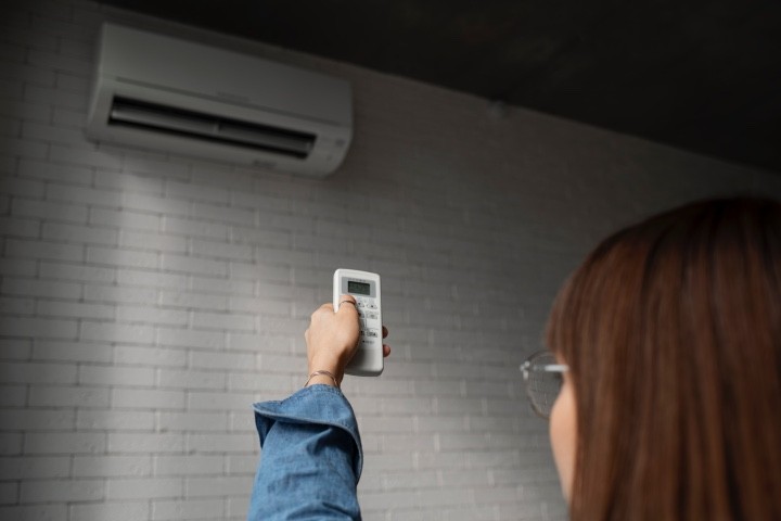 young woman using home technology