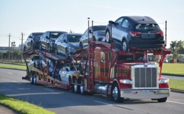 ship car in a carrier trailer in street