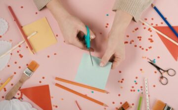 woman making crafts with papers