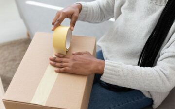 woman packing fragile items