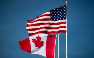 flag of canada and united states waving