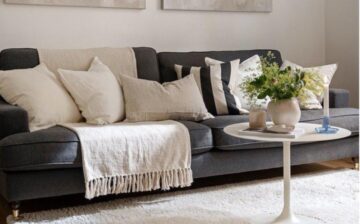 grey armchair with white cushions