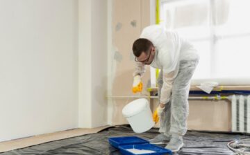 professional painter painting house