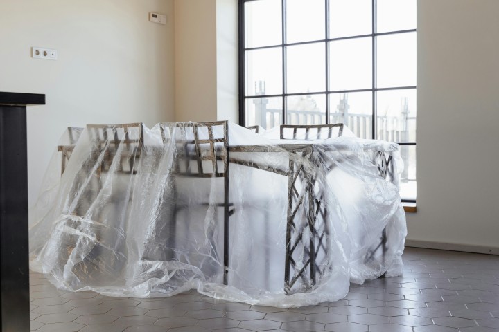 Dining Table and Chairs Covered with Plastic