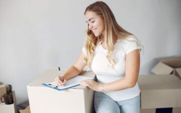 woman doing the pre moving checklist