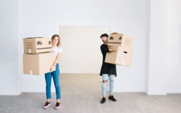 moving concept with couple holding